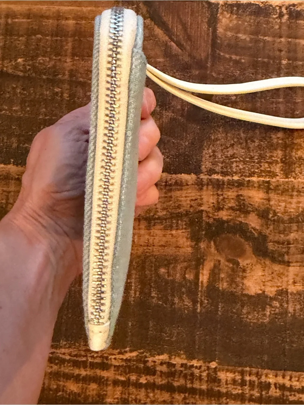 kate spade light denim wristlet with cream strap